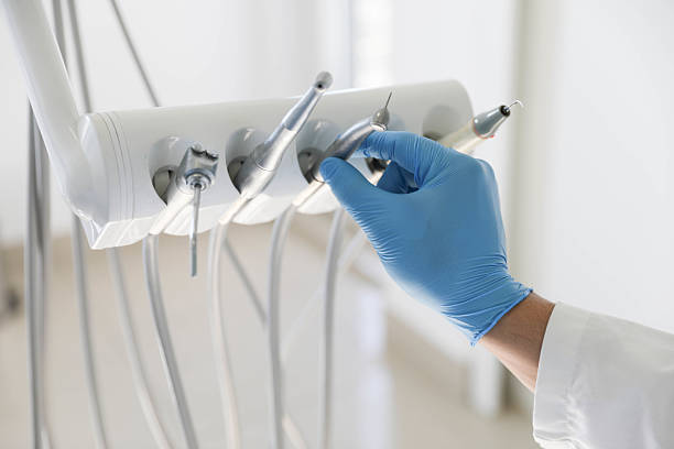 Professional Tooth Extraction technician working in San Bruno, CA